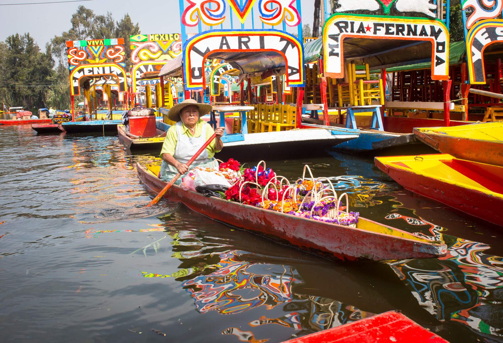 Colorful traditional mexican boats trajineras.; Shutterstock ID 1129089545; Purpose: Product; Brand (KAYAK, Momondo, Any): Momondo